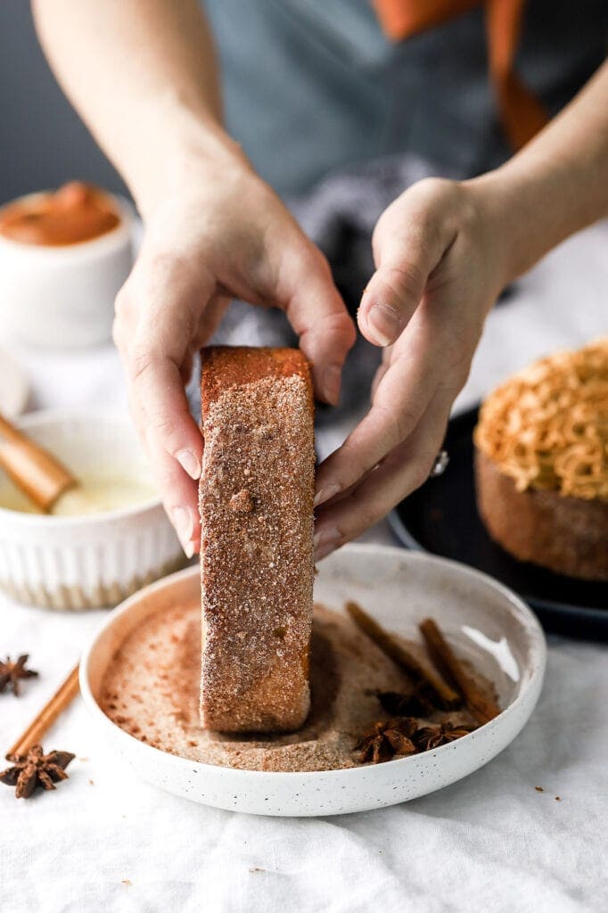 cake rolled in cinnamon sugar mixture
