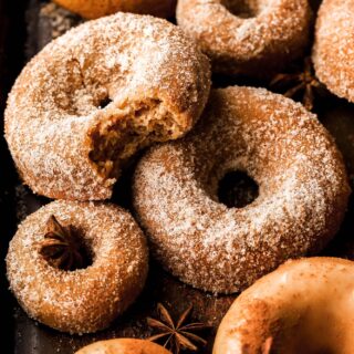 apple cider donuts with bite taken out