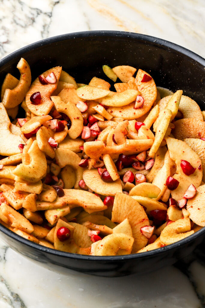 apples tossed with the rest of the ingredients for the filling