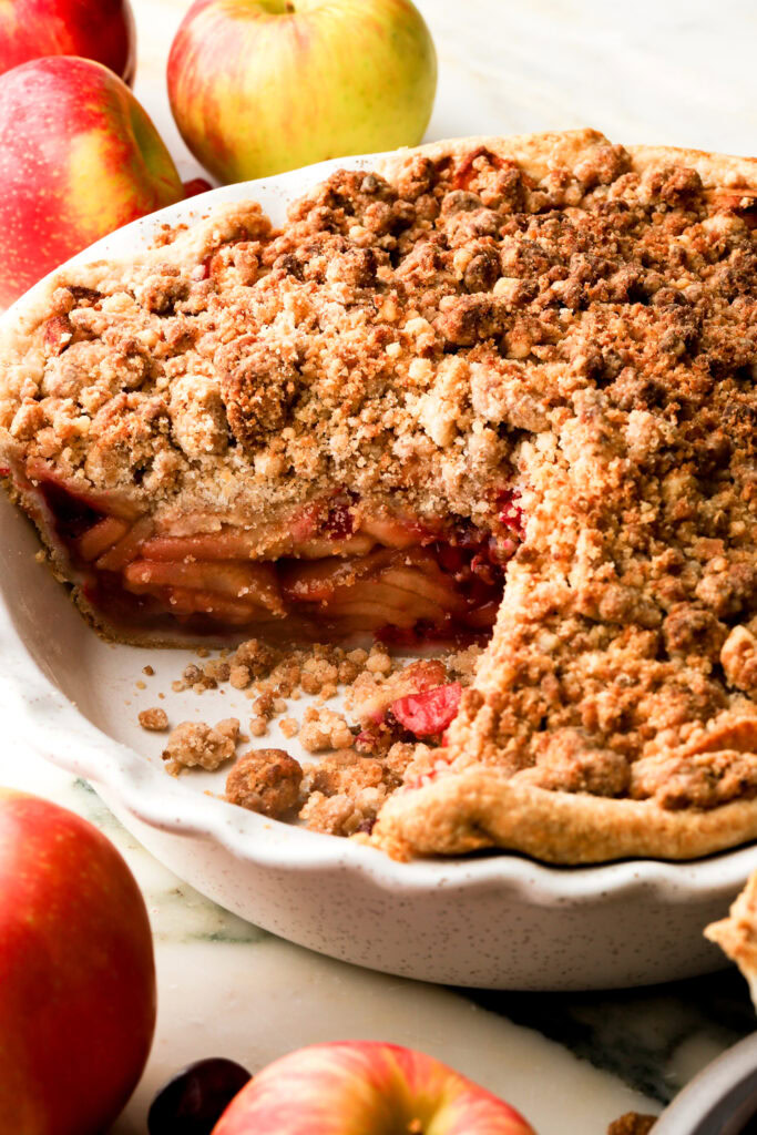 cranberry apple pie in the pan sliced