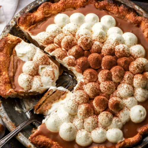 apple cream pie with slice cut out