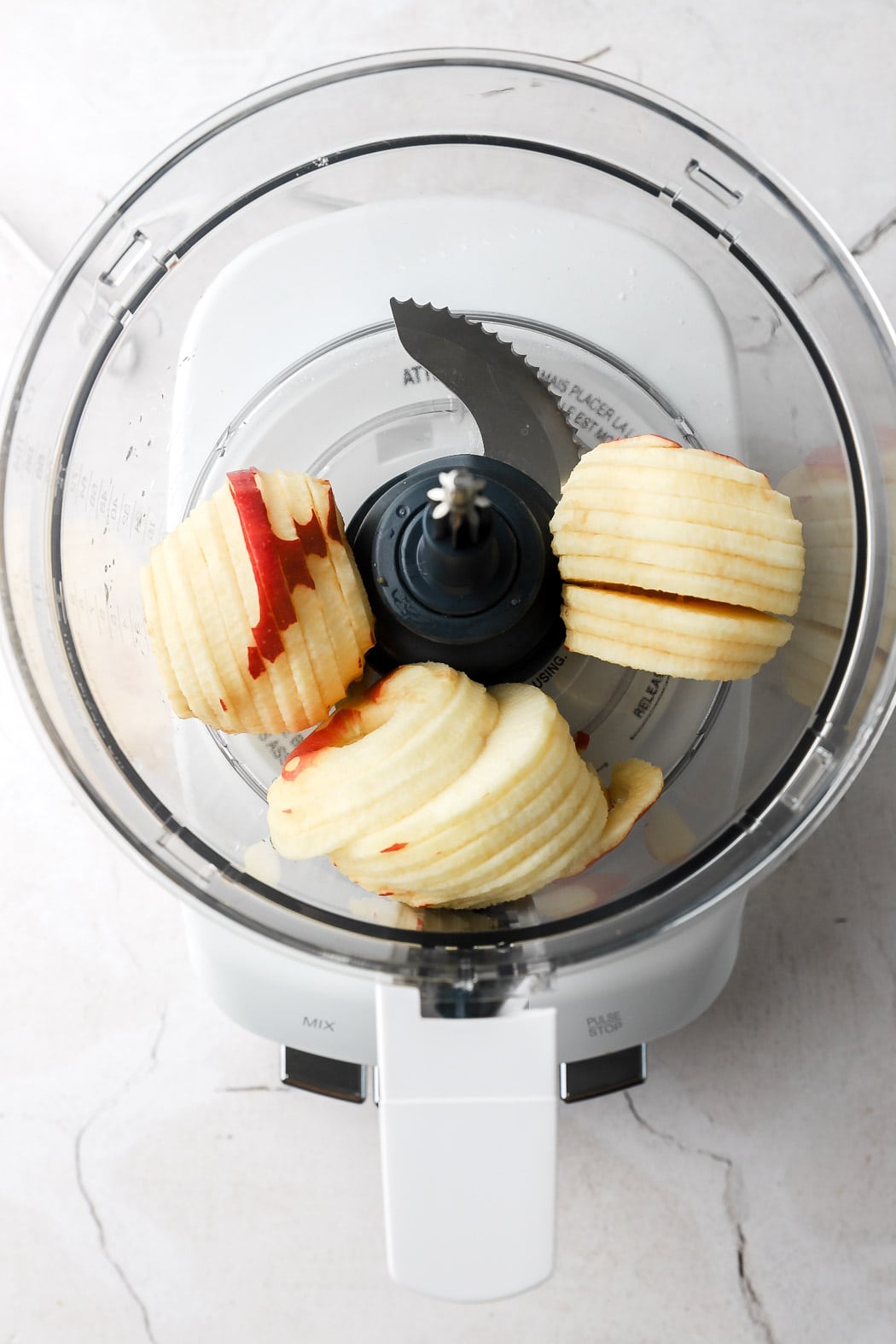 sliced apples in food processor
