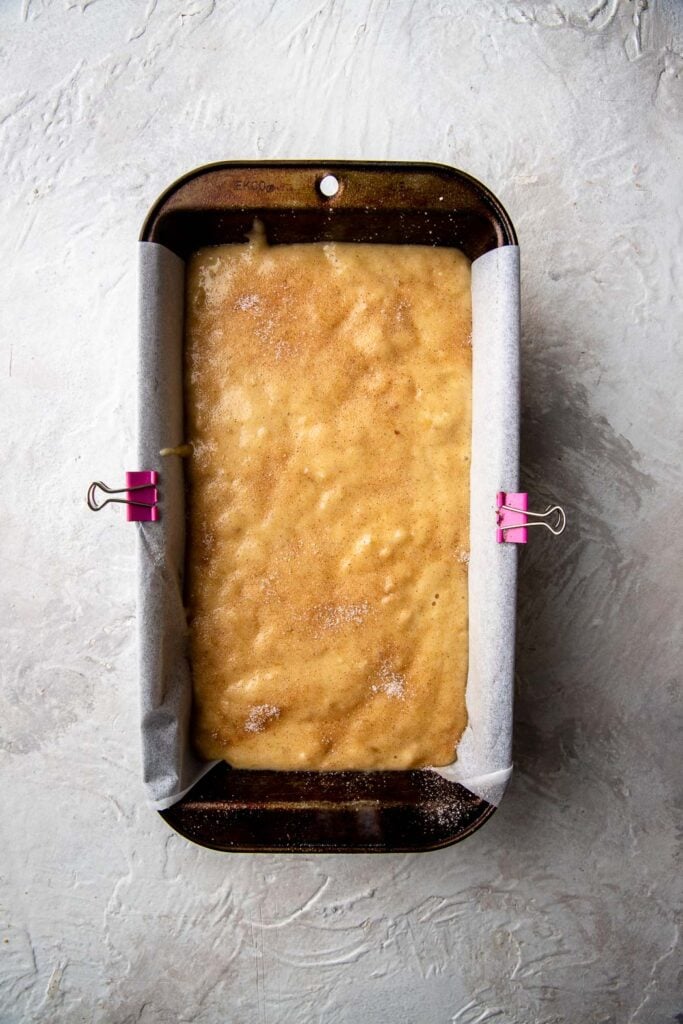 pour into prepared loaf pan and top with cinnamon sugar