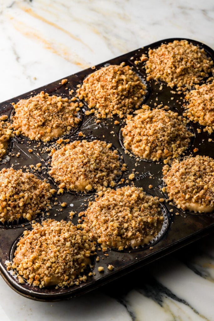 muffins topped with sugared pecans