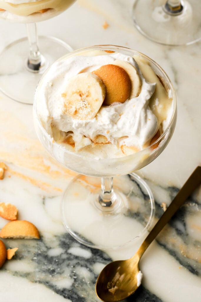 close up of banana pudding cups with a bite taken out