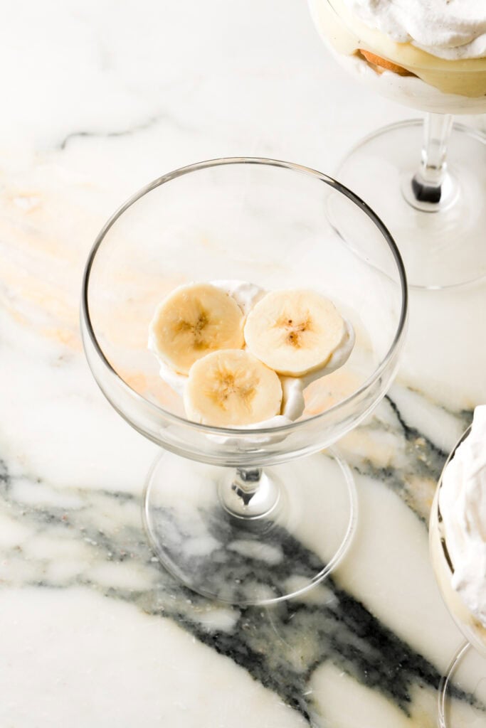 banana slices on top of whipped cream
