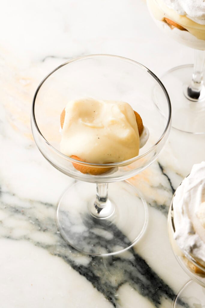 pastry cream on top of vanilla wafer cookies