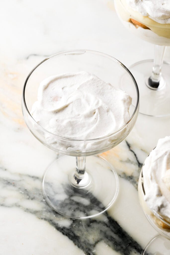 whipped cream on top of vanilla wafer cookies
