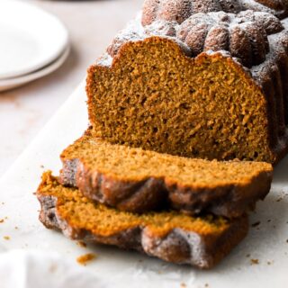 pumpkin banana bread dusted with powdered sugar