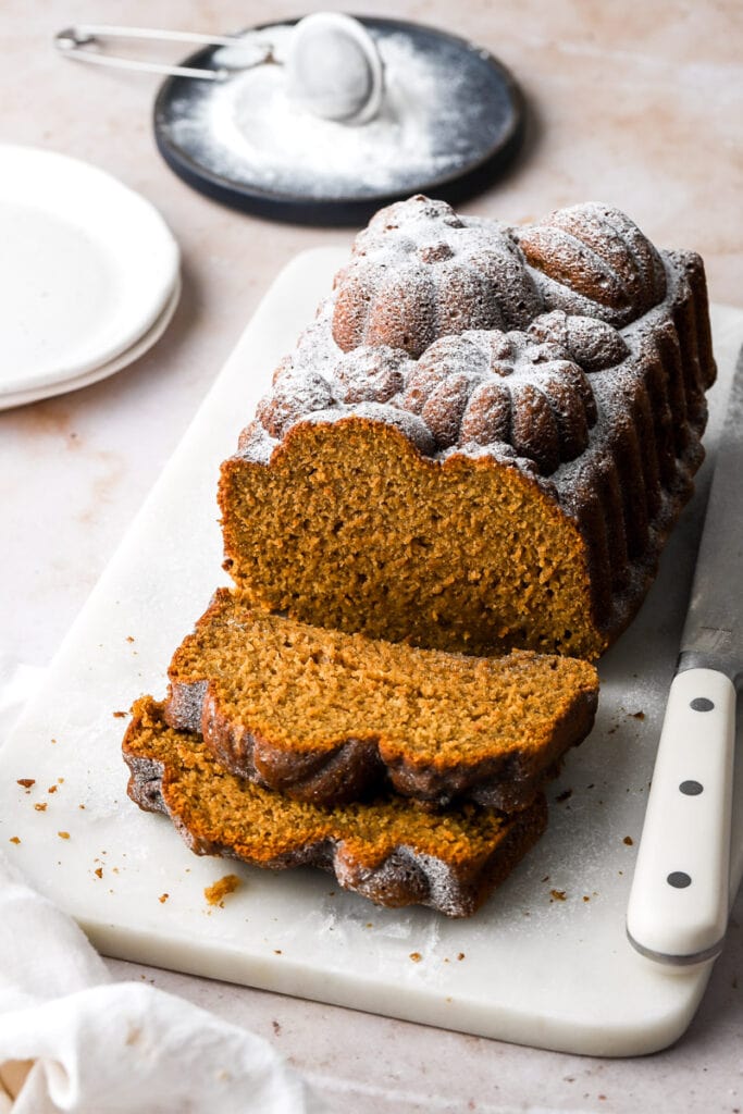 pumpkin banana bread dusted with powdered sugar
