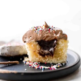 vanilla cupcake with milk chocolate ganache filling and chocolate buttercream