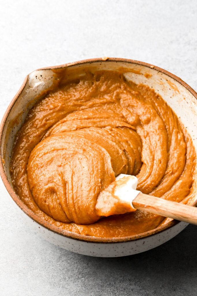 flour and cookie crumbs folded into batter