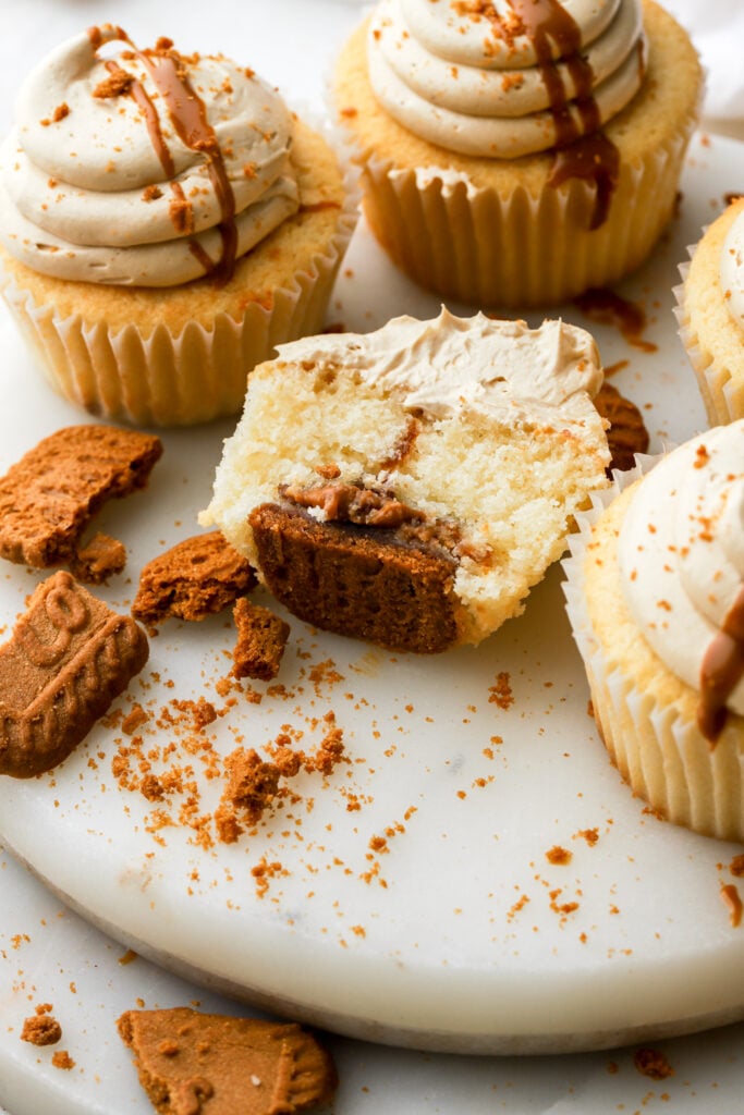 biscoff cookie on the bottom of a cupcake