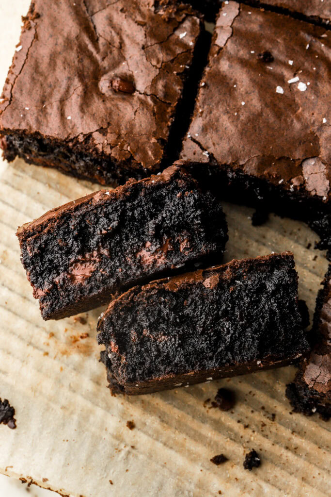 black cocoa brownies sliced with chocolate chips inside