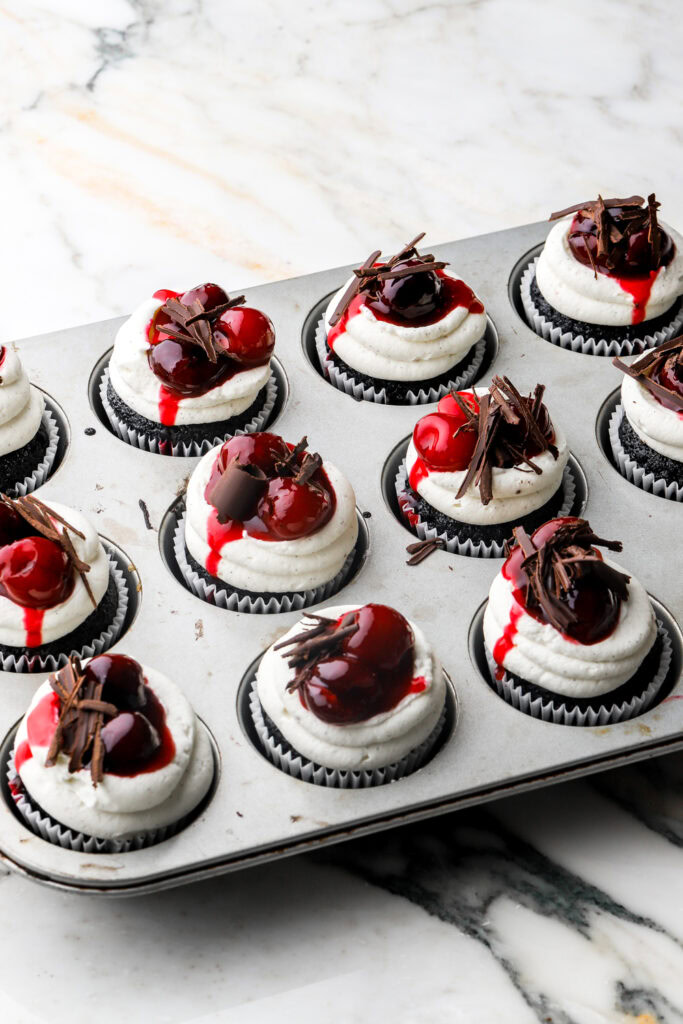 cupcakes topped with chocolate curls