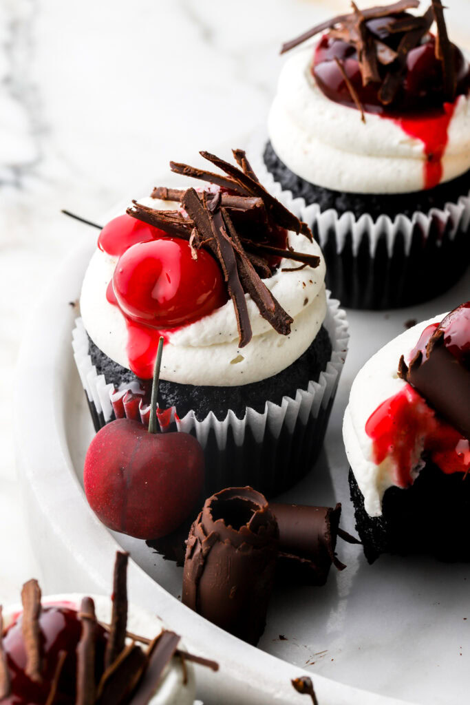 black forest cupcakes on a marble tray