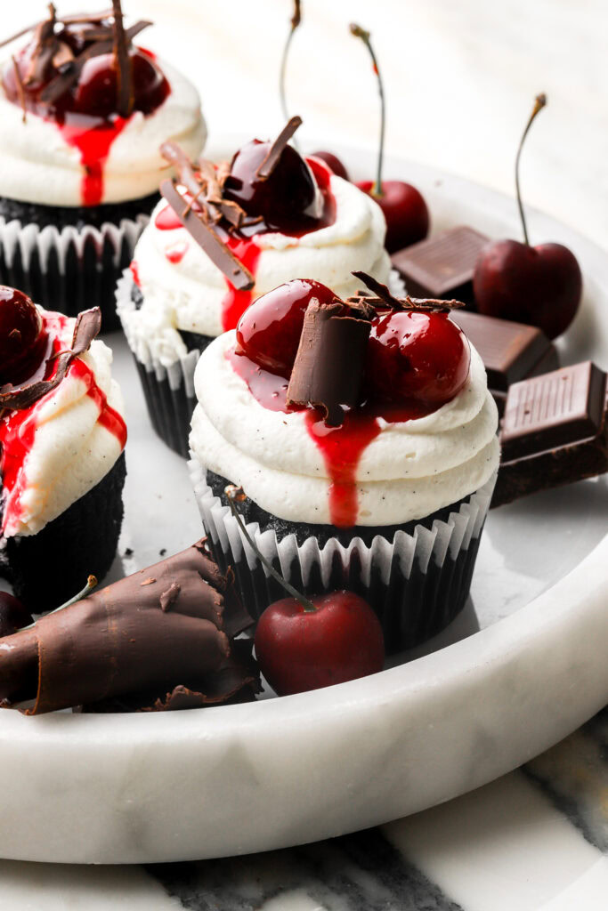 black forest cupcakes on a marble tray