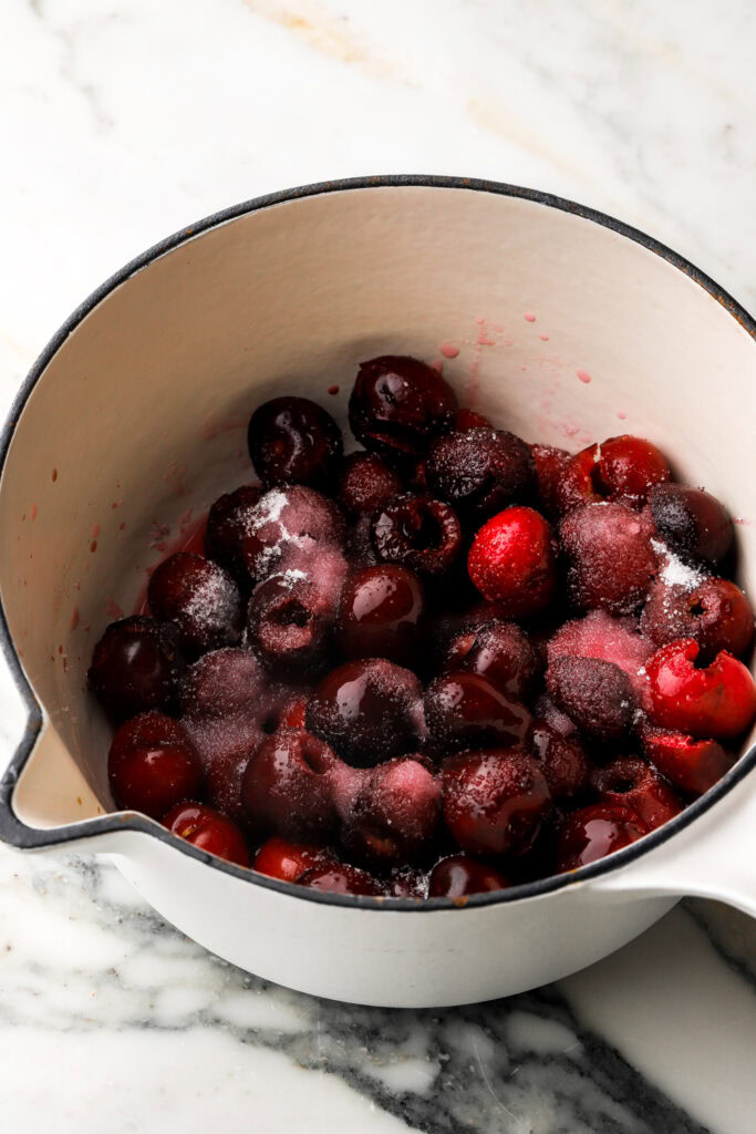 cherries pitted and whole, tossed with sugar, lemon juice and liqueur