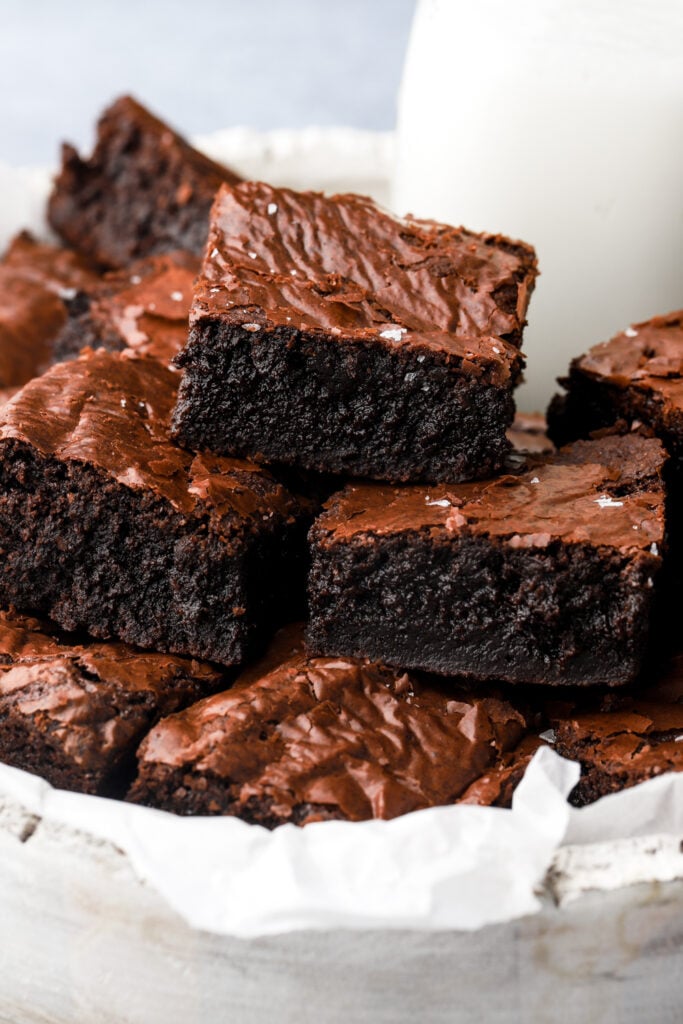 brown butter brownies stacked in a plate