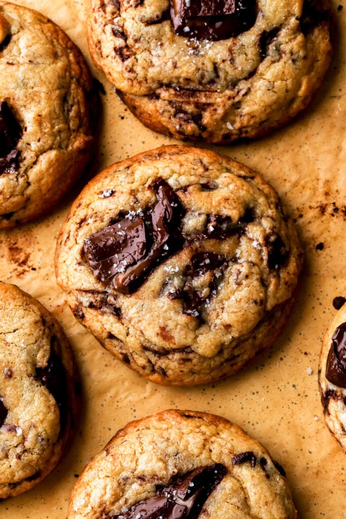 close up of brown butter chocolate chip cookies topped with sea salt