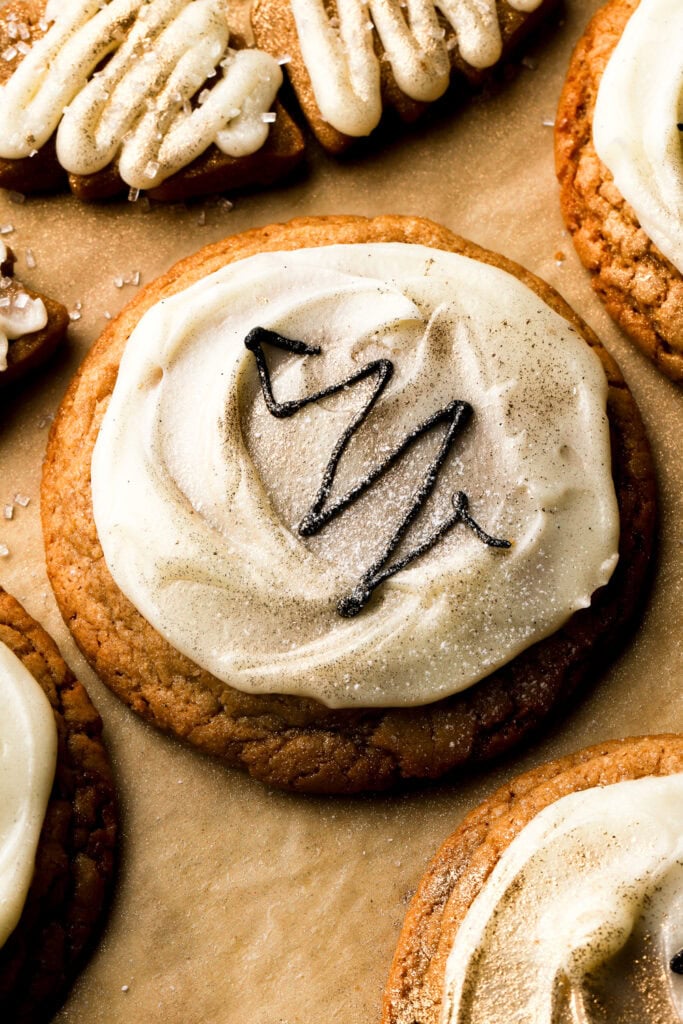 brown sugar cookies topped with frosting and christmas tree design