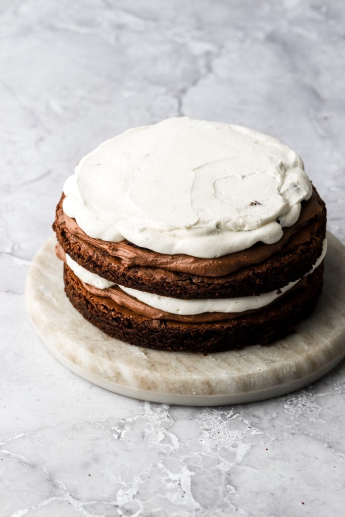 brownie chunk layer topped with vanilla cream cheese frosting