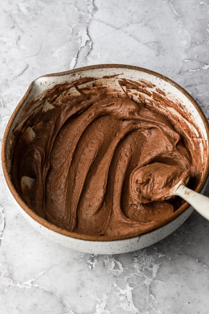 1/3 of the frosting removed to add cocoa powder