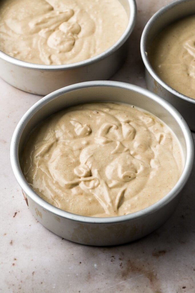 batter distributed between three pans