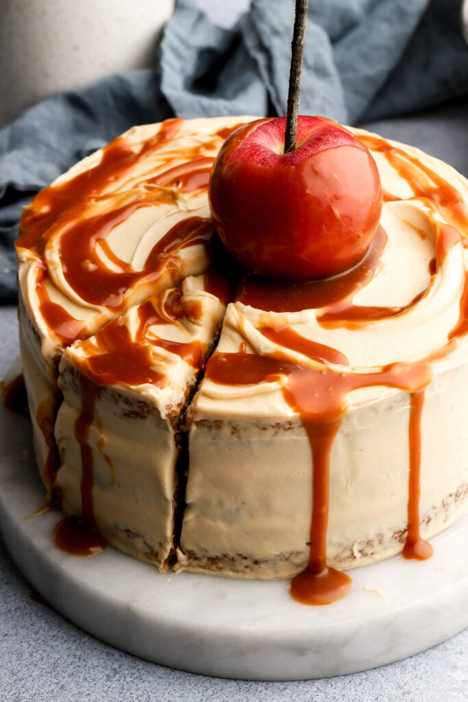 caramel apple cake with a slice cut