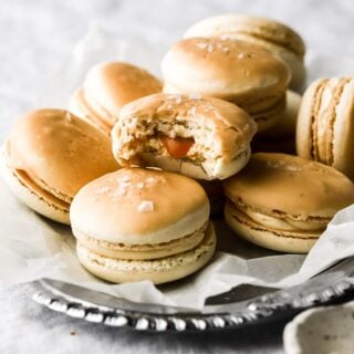 salted caramel macarons with dripping caramel sauce