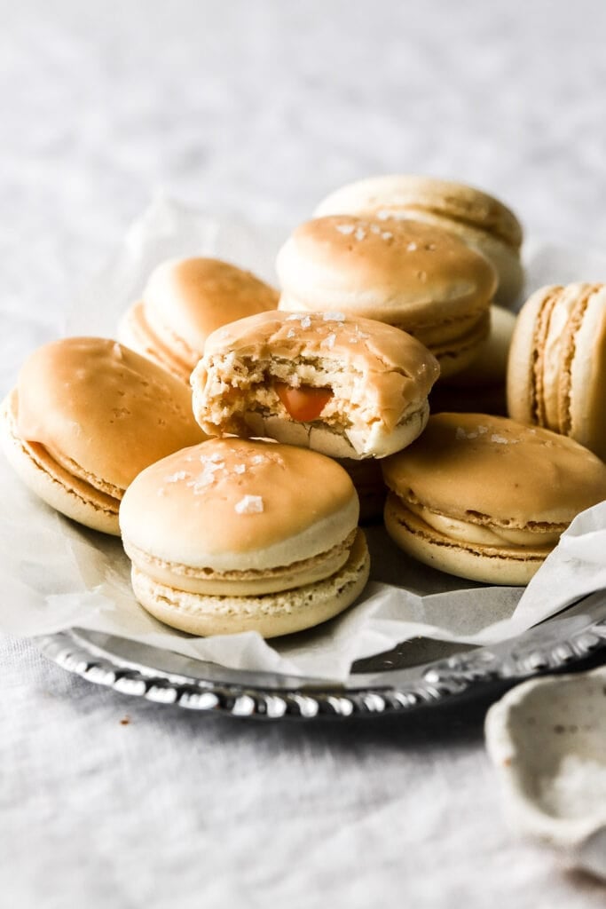 salted caramel macarons with dripping caramel sauce