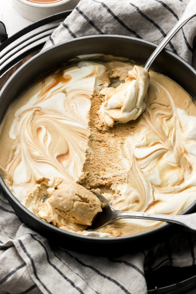 finished caramel macchiato ice cream with a spoons scooping ice cream
