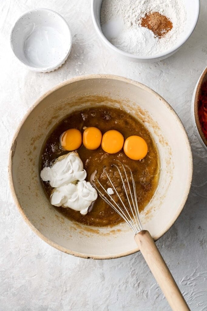 whisk in eggs and sour cream