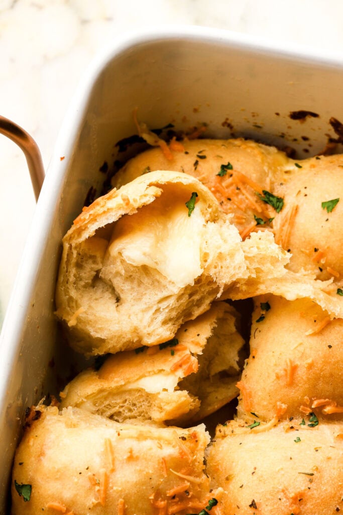 cheese bread roll opened with cheese inside