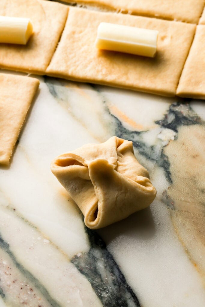 pinch the edges around the cheese