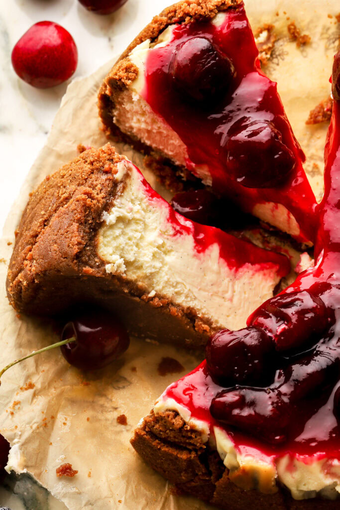 close up of cherry cheesecake slice on it's side