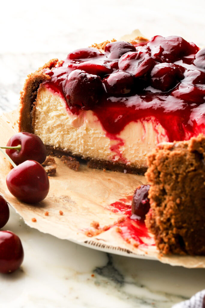 close up of cherry cheesecake sliced into