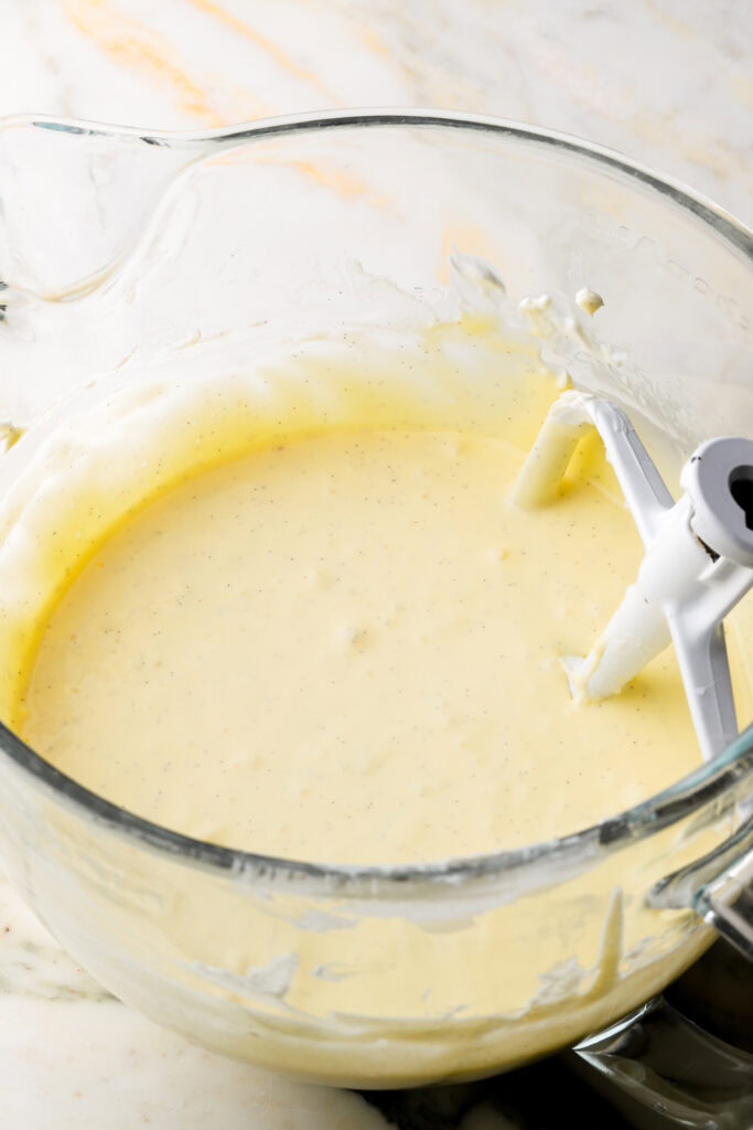 sour cream, vanilla and eggs mixed into cheesecake batter