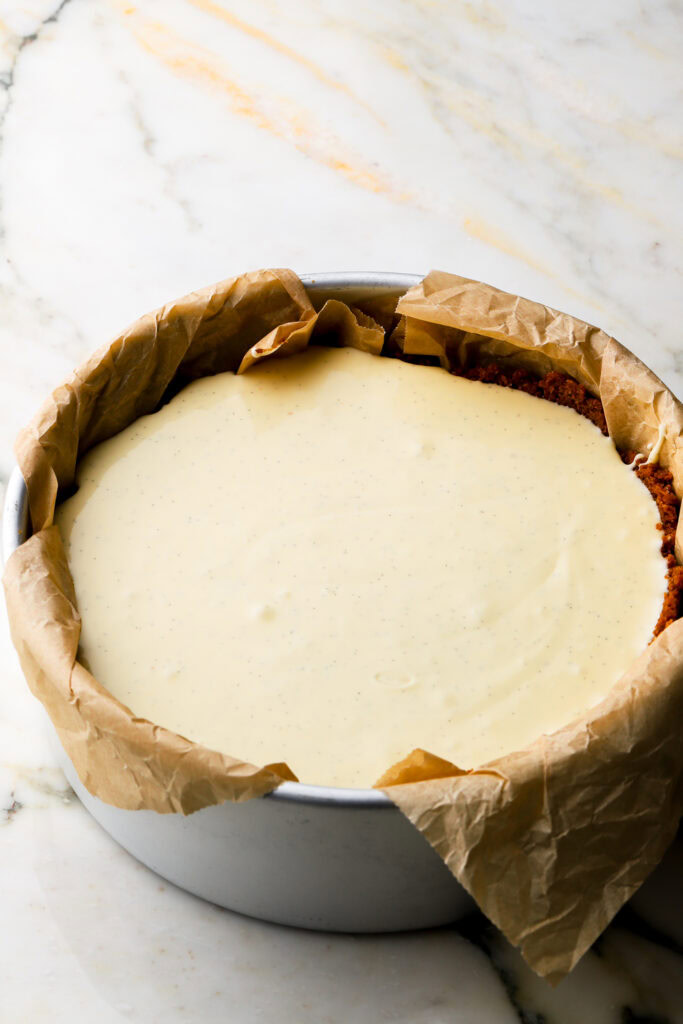 cheesecake batter poured into crust