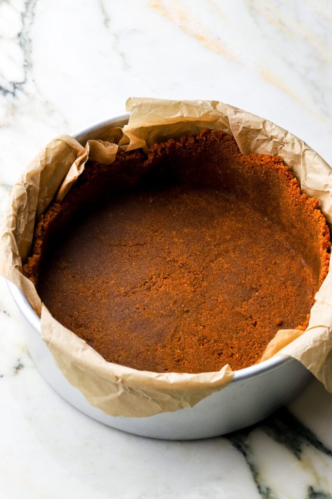 biscoff crust pressed into pan