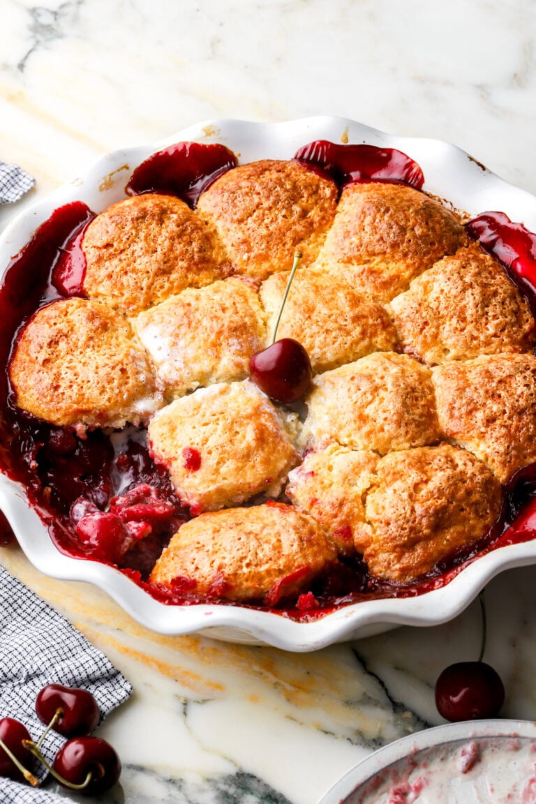 cherry cobbler with a black cherry on top