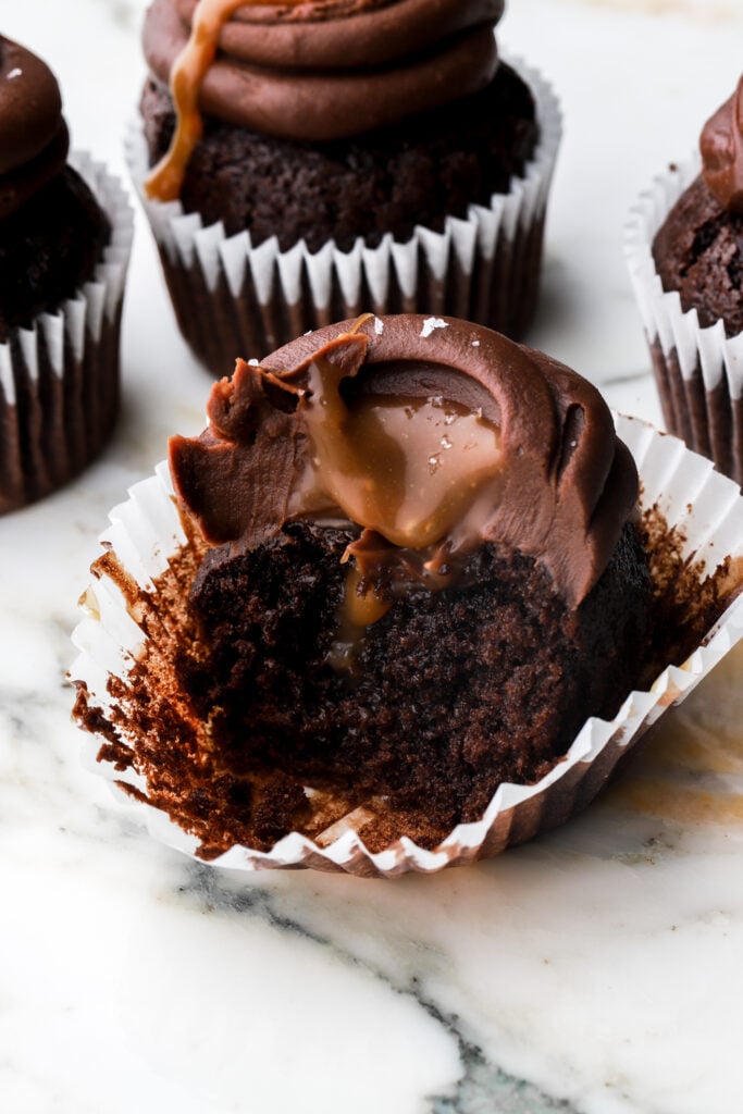 chocolate caramel cupcakes with a bite taken out