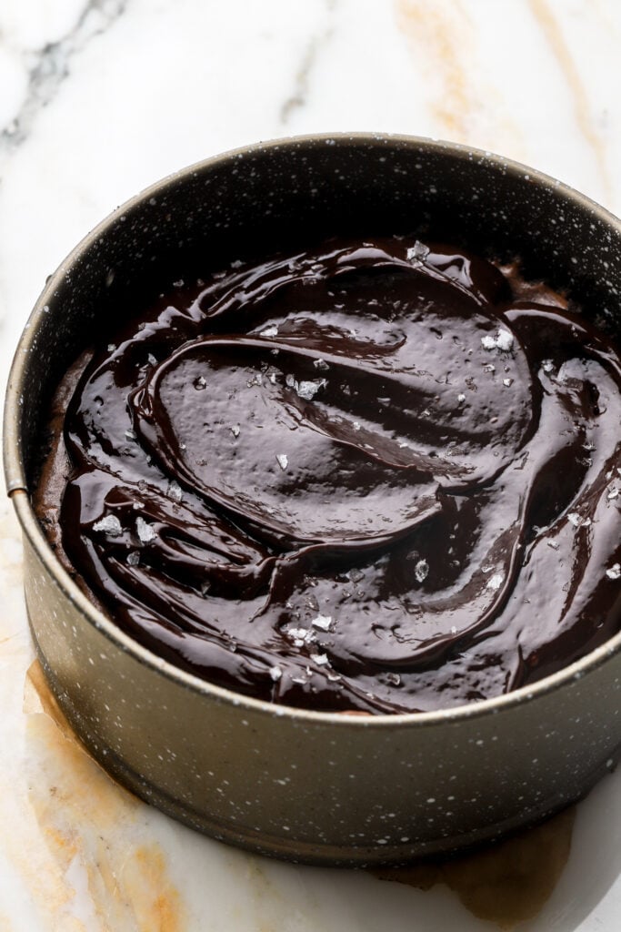 cheesecake topped with chocolate ganache