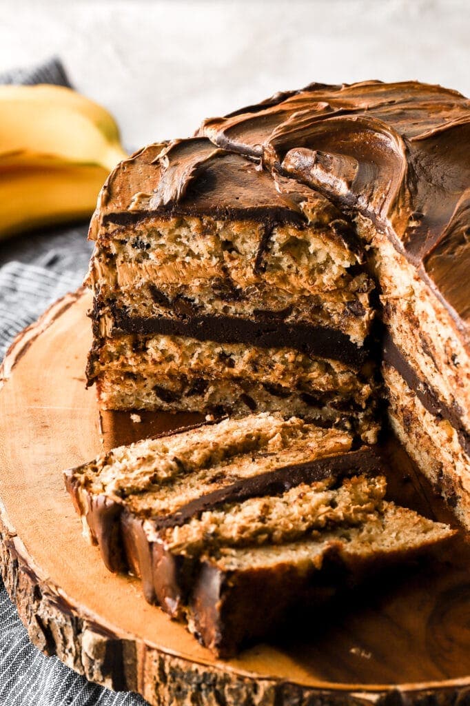 peanut butter banana chocolate chip cake with cut slice