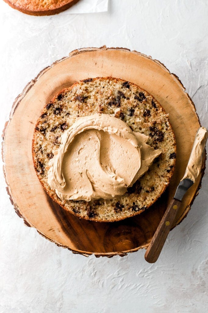 chocolate chip banana cake layer frosted with peanut butter Swiss meringue buttercream