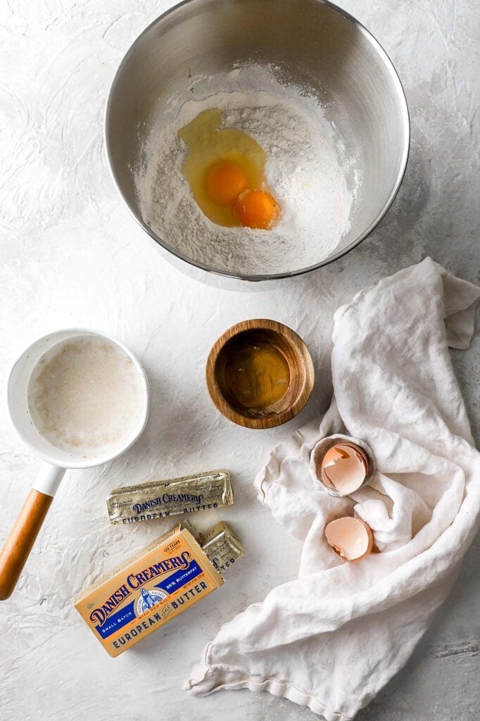 yeast in warm milk; eggs with flour and sugar