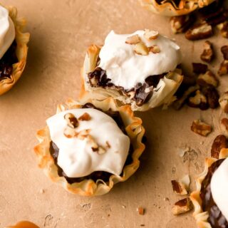 chocolate praline pies with bite taken out
