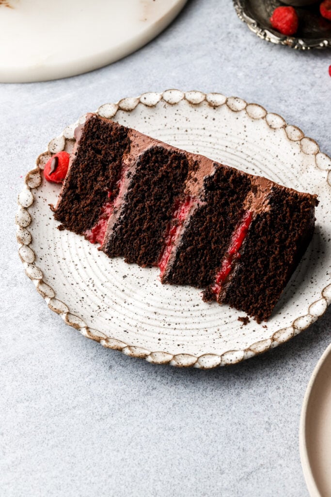 slice of chocolate raspberry cake on a plate
