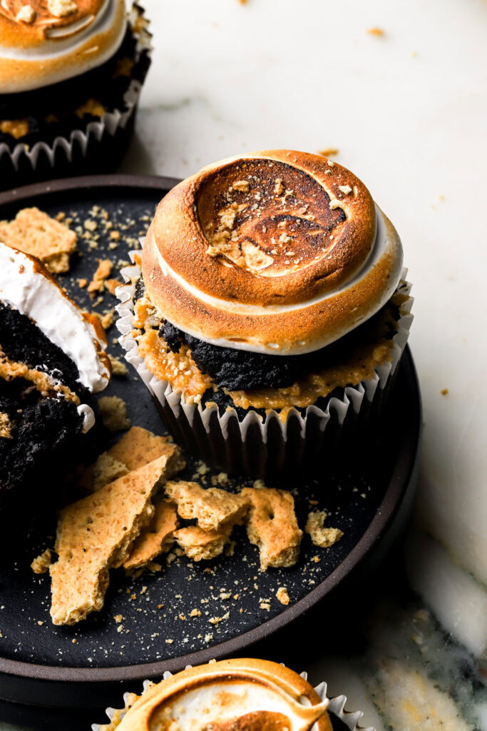 chocolate s'mores cupcake with toasted meringue on top