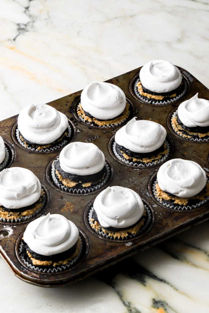 meringue piped on top of cupcakes